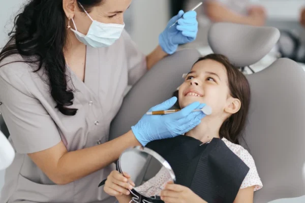 little_beautiful_girl_dentist_smiling_1